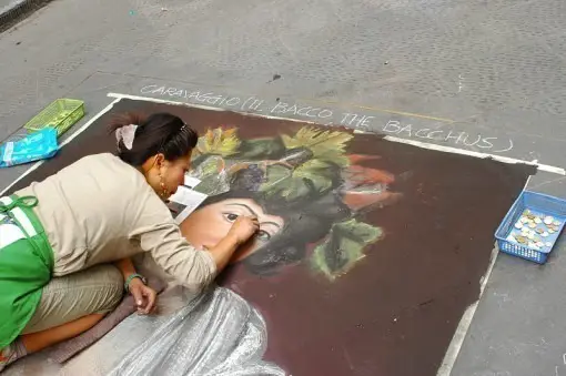 woman-doing-art-on-sidewalk